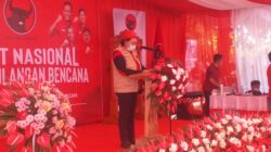 ADRIANA CH. DONDOKAMBEY saat membacakan laporan pelaksnaan Diklat Nasional